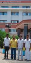 May be an image of 4 people, people smiling, hospital, temple and text